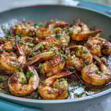 Healthy Easy One-Pan Lemon Garlic Shrimp and Asparagus with vibrant green asparagus and juicy shrimp, tossed in a bright lemon-garlic sauce and roasted to perfection.