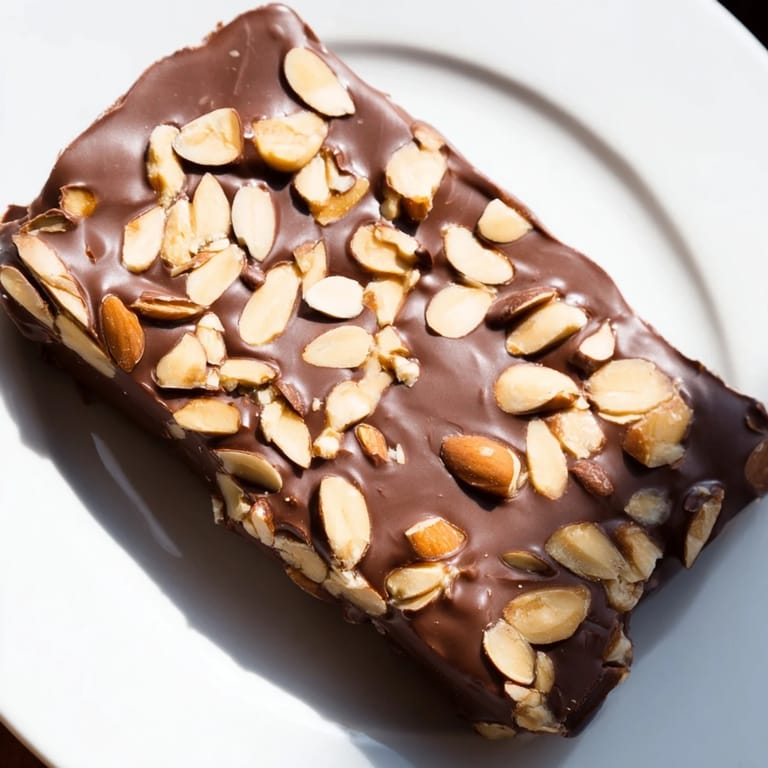 Homemade English toffee, a delicious dessert with a satisfying crunch and balanced chocolate flavor.