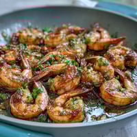 Healthy Easy One-Pan Lemon Garlic Shrimp and Asparagus with vibrant green asparagus and juicy shrimp, tossed in a bright lemon-garlic sauce and roasted to perfection.